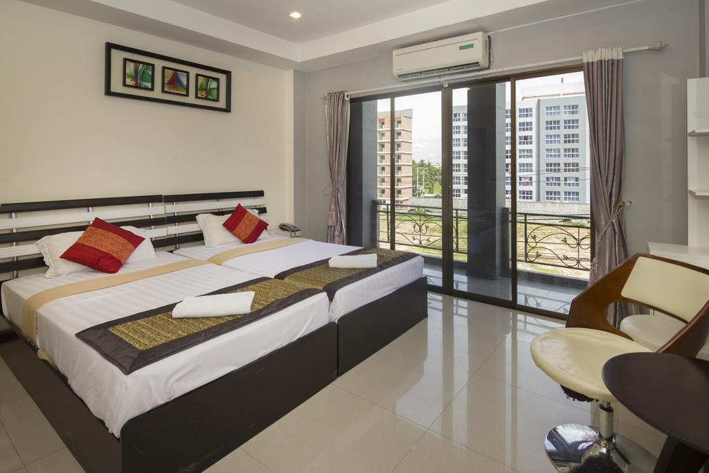 Royal Q & D Suites Pattaya Extérieur photo